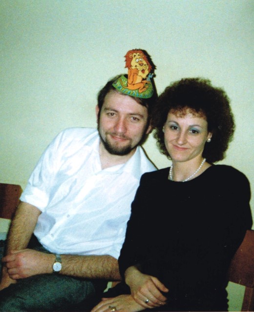 Steve wearing party hat and Barbara  
