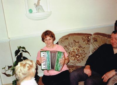 Barb playing accordian  
