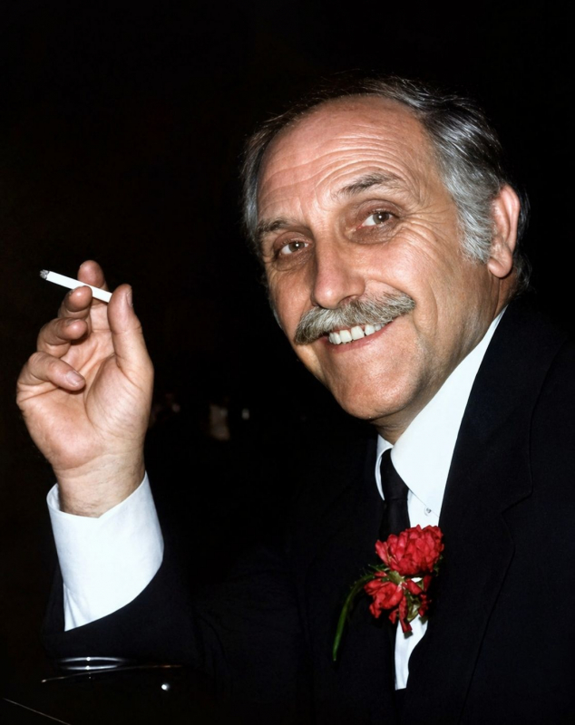 Dapper Ronald Benson with cigarette
